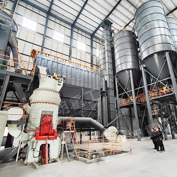 Close-up of coal grinding rollers and table